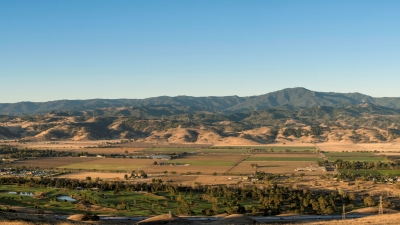 Panorama view of Coyote Valley's fields looking west towards foothills and Santa Cruz Mountains