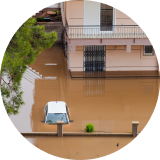 Flooded neighborhood with cars underwater